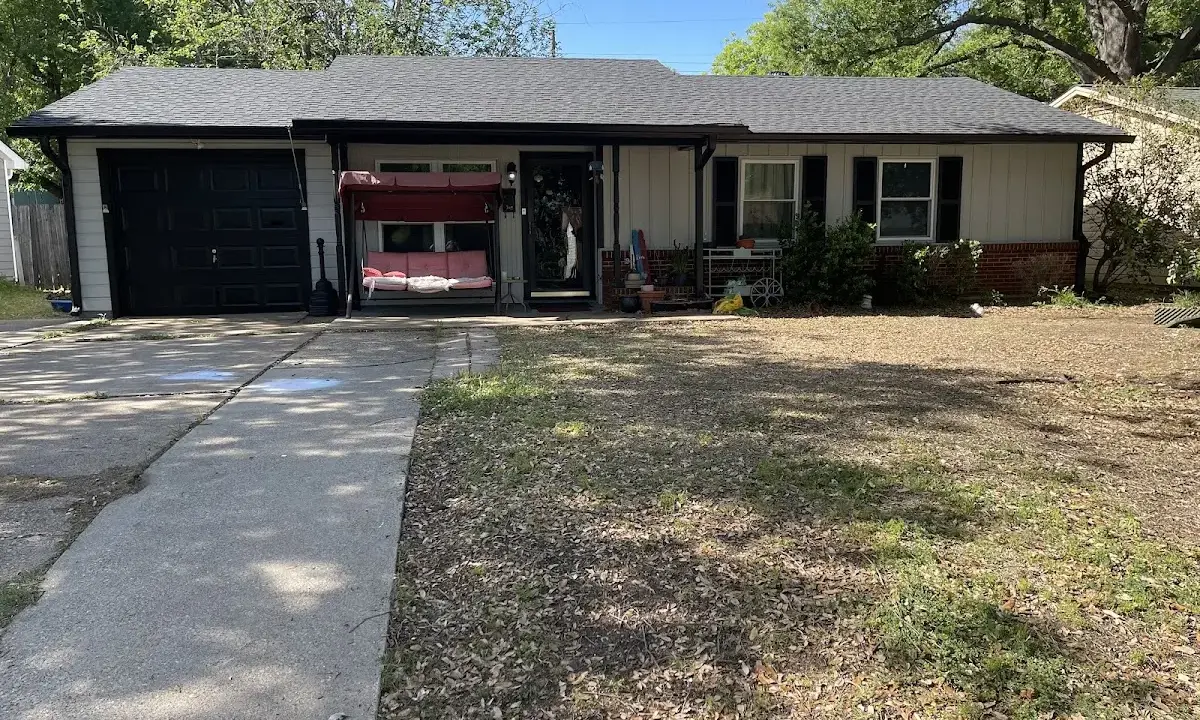 Soffit & Fascia Repair crew at work on a residential roof in Baton Rouge